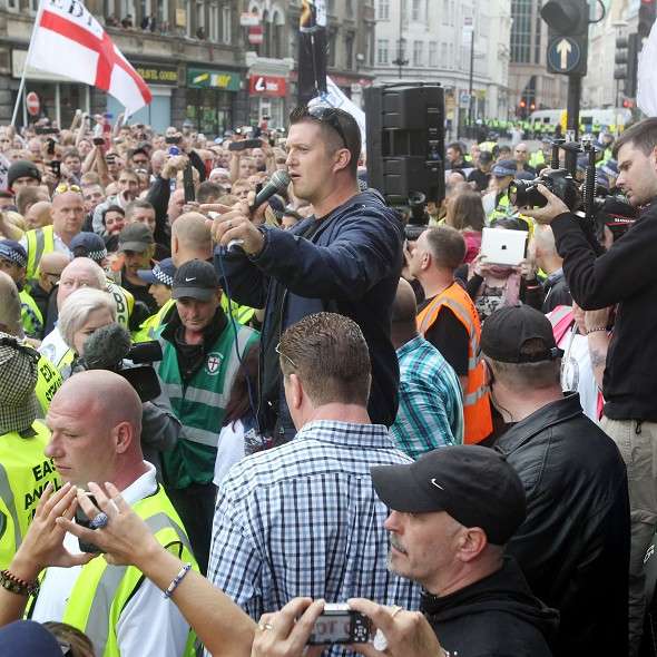 English-Defence-League-leader-Tommy-Robinson-speaks-at-the-march-in-east-London-prior-to-his-arrest-PA-