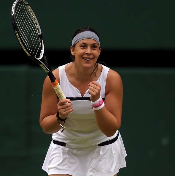 Marion-Bartoli-pictured-eased-to-victory-against-semi-final-opponent-Kirsten-Flipkens